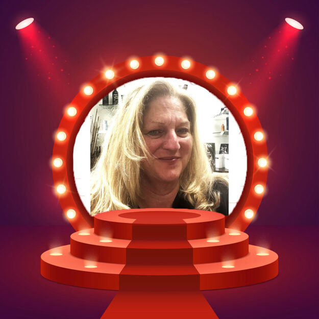 Lisa Schirz profile picture in a theater frame.