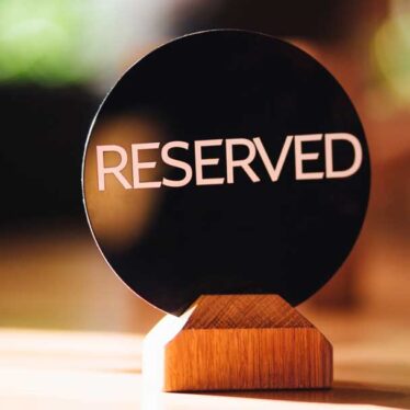 Reserved sign on table