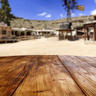 Close up of table with blurred background of western street