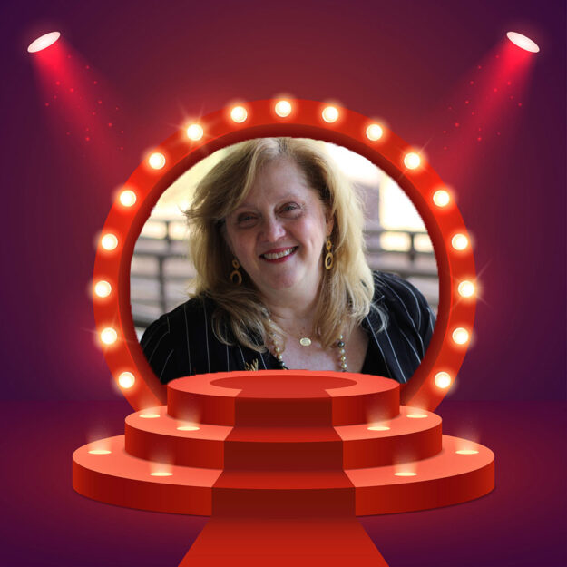 Tracy Wilke profile picture in a theater frame.