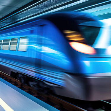 Blurred motion of a blue train.