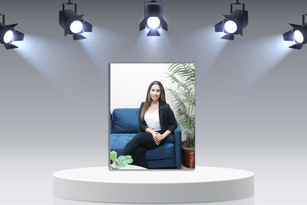 Amy Moufarrege profile picture on podium with lights.