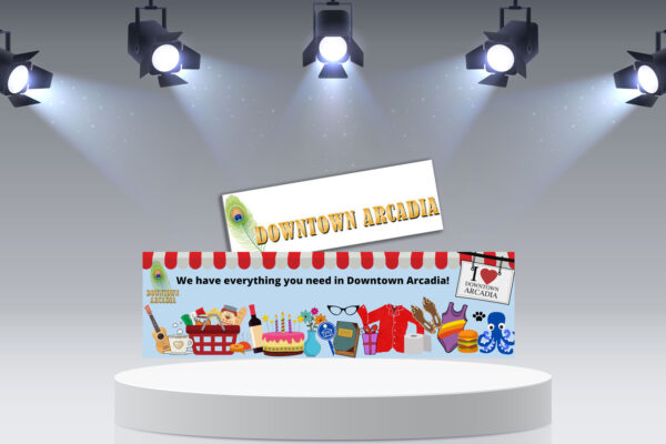 Downtown Arcadia logo and banner profile picture on podium with lights.
